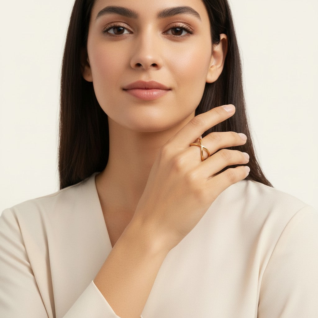 Seraphina Treasures Alcyone gold cuff bracelet with an abstract, intertwined design.