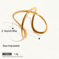 Seraphina Treasures Alcyone gold-tone adjustable ring with abstract crossover design, waterproof and hypoallergenic.