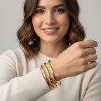 Seraphina Treasures Amaris gold-tone bracelets with colorful zircon stones and clear crystals. Adjustable open design.
