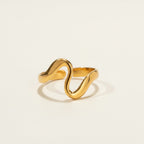 Seraphina Treasures Amarisya gold wavy statement ring with smooth, flowing curves.