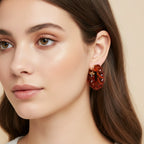 Seraphina Treasures Caelis amber resin twisted hoop earrings, 26mm diameter, gold-tone posts.