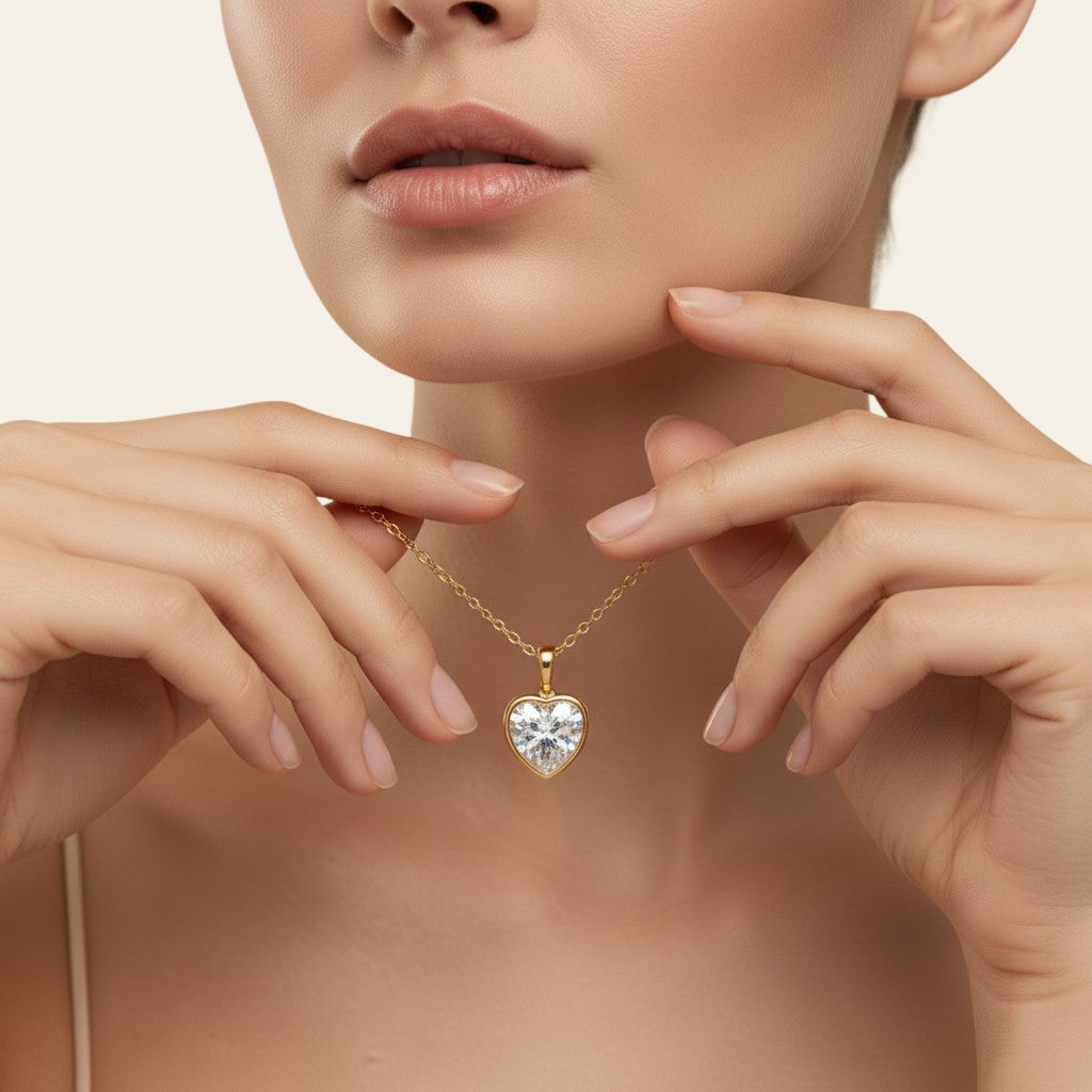 Seraphina Treasures Amoria gold necklace with a heart-shaped clear zircon pendant. Elegant sparkle for any occasion.