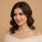 Seraphina Treasures Angelure necklace with a round pendant featuring an angel design and rope-like border. Silver-tone metal.