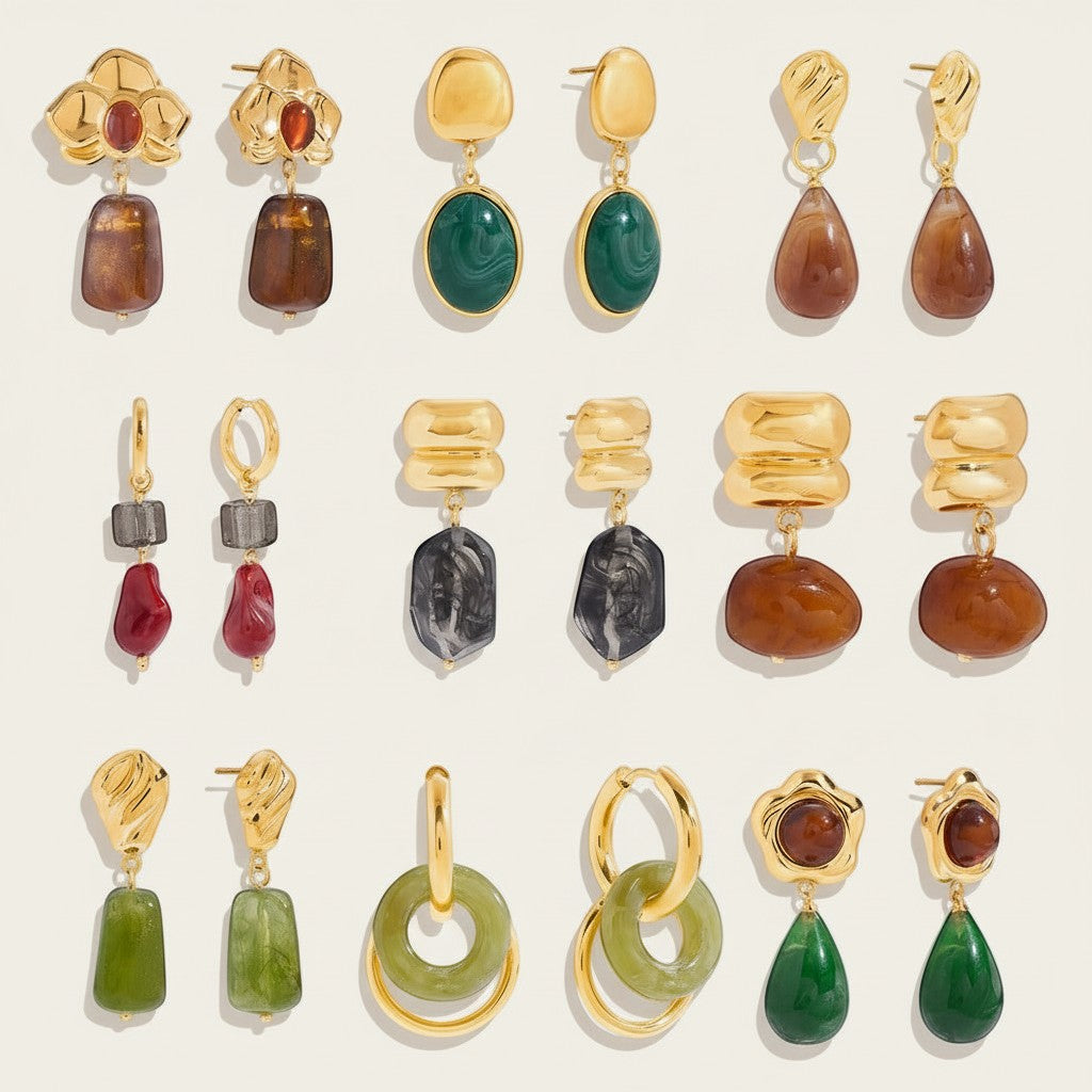 Seraphina Treasures Orantheia earrings: gold-tone, resin, various shapes and colors including green, brown, red, and grey.