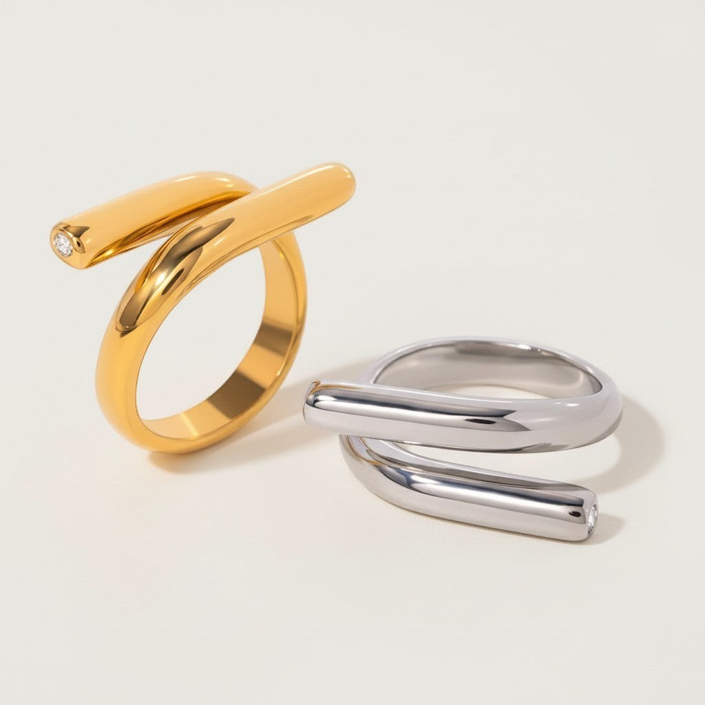 Seraphina Treasures Ariadne gold and silver rings with zirconia accents and modern spiral design.