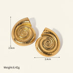 Seraphina Treasures Aurelia gold spiral shell earrings with textured finish. Lightweight and unique design.