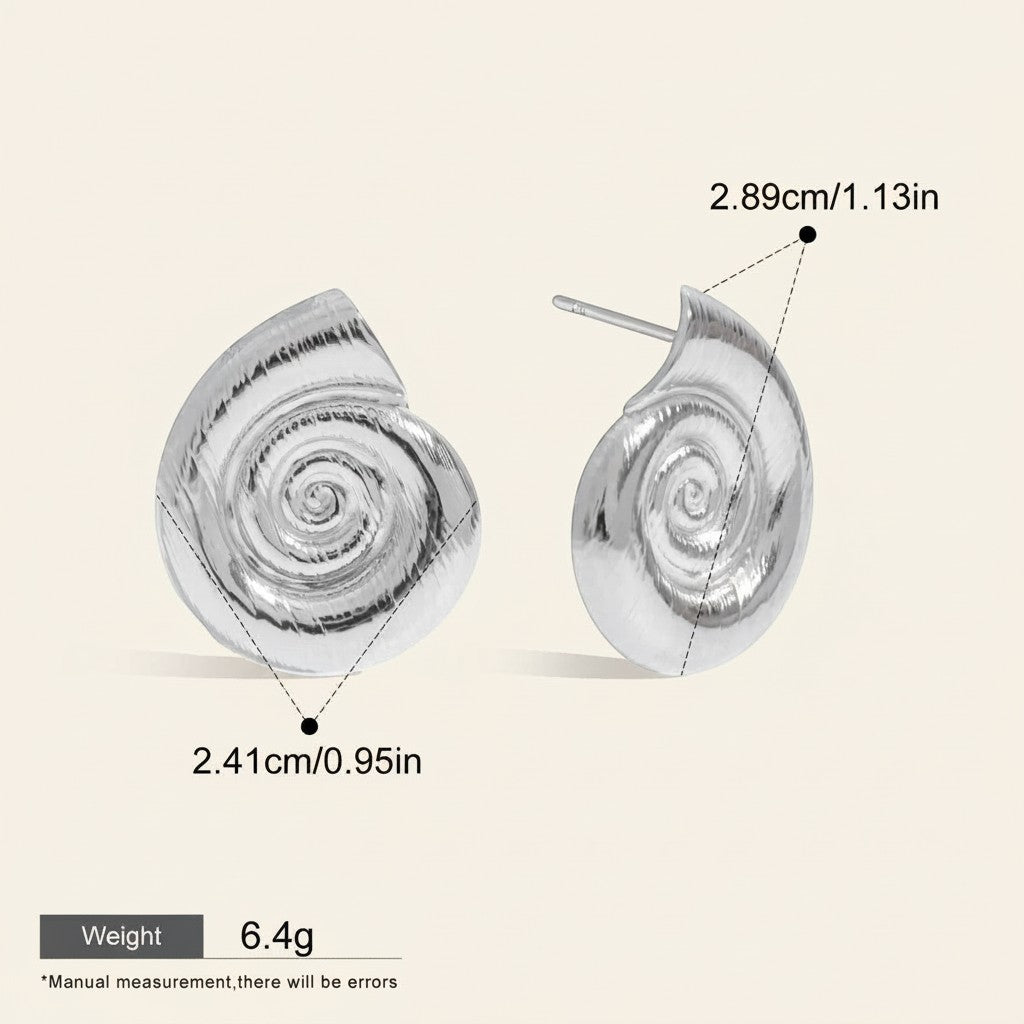 Seraphina Treasures Aurelia silver spiral shell stud earrings. Unique design, lightweight, and hypoallergenic.