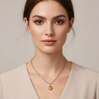 Seraphina Treasures Aureline necklace with a silver chain and a gold heart pendant. Delicate and elegant.