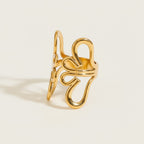 Seraphina Treasures Aurelune gold ring with abstract floral geometric design. Modern, airy statement ring.