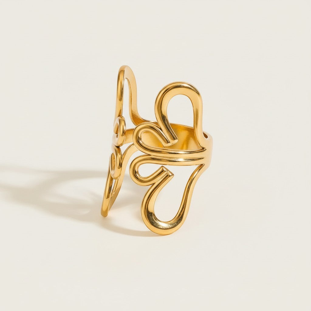 Seraphina Treasures Aurelune gold ring with abstract floral geometric design. Modern, airy statement ring.