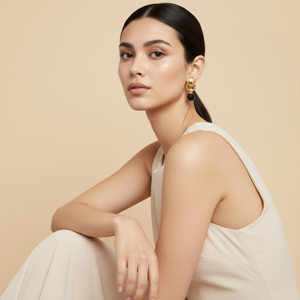 Seraphina Treasures Aurethia gold hoop earrings with black crystal drop. Elegant and lightweight.