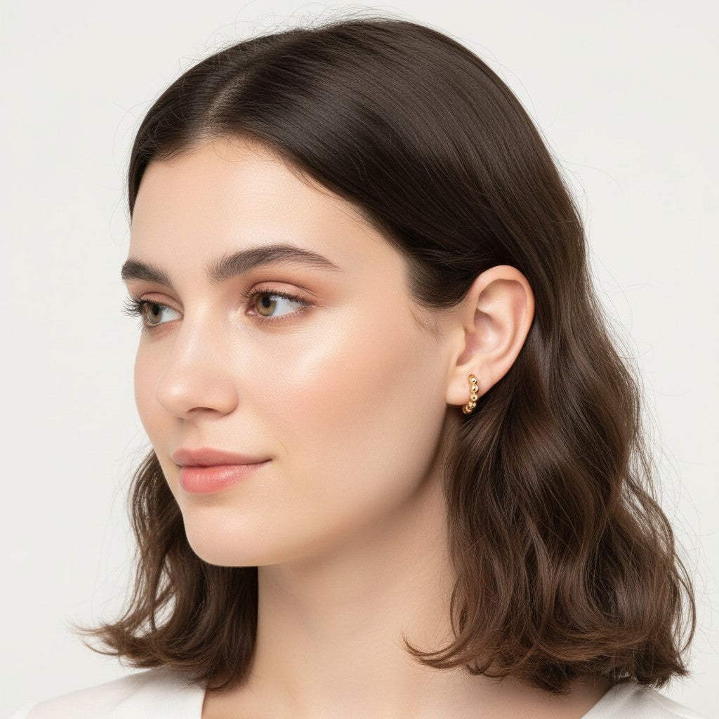 Seraphina Treasures Aurevya gold ear clip with geometric beads, no piercing needed.