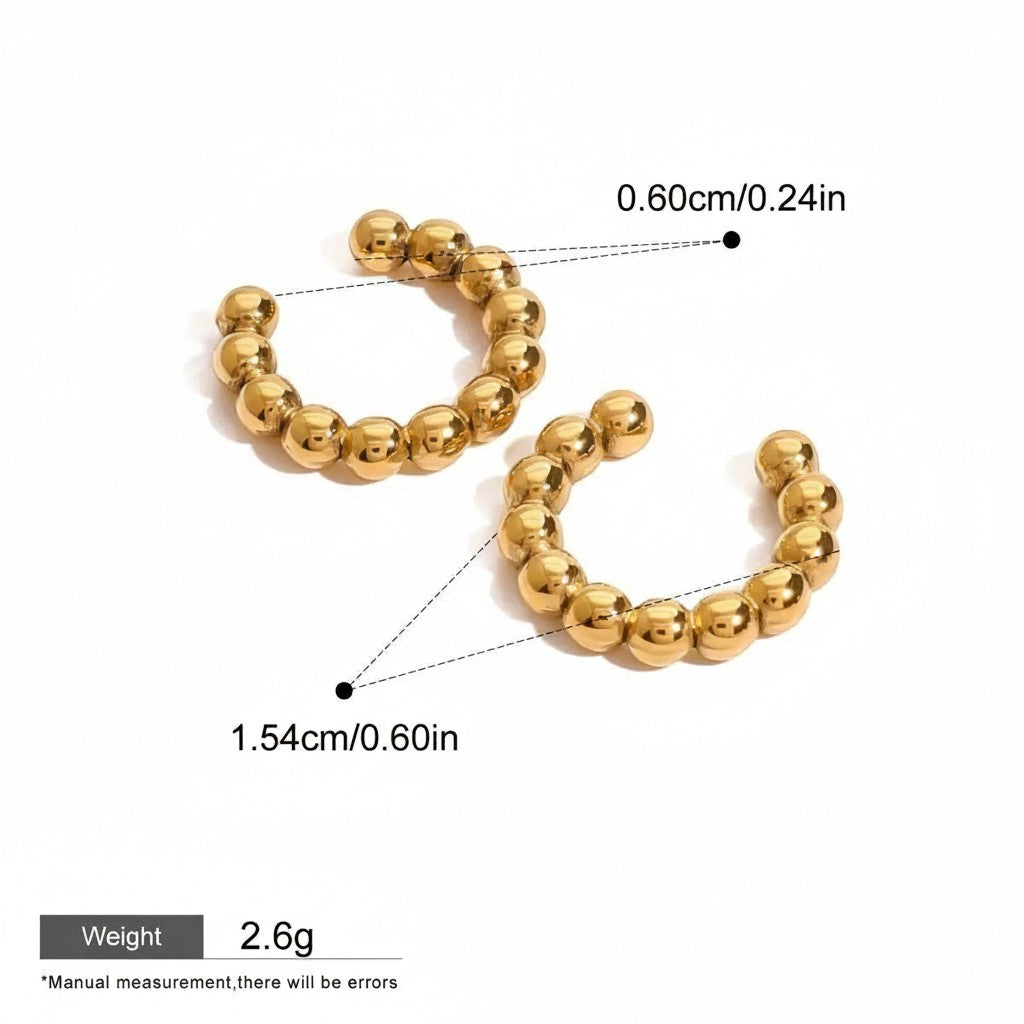Seraphina Treasures Aurevya gold-tone ear clips with geometric bead design. Waterproof and hypoallergenic.