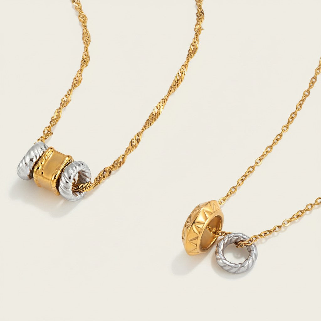 Seraphina Treasures Bellona necklace with intertwined gold and silver tone rings, a symbol of connection and harmony.