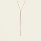 Seraphina Treasures Branwen gold Y-necklace with white zirconia stones, adjustable length.