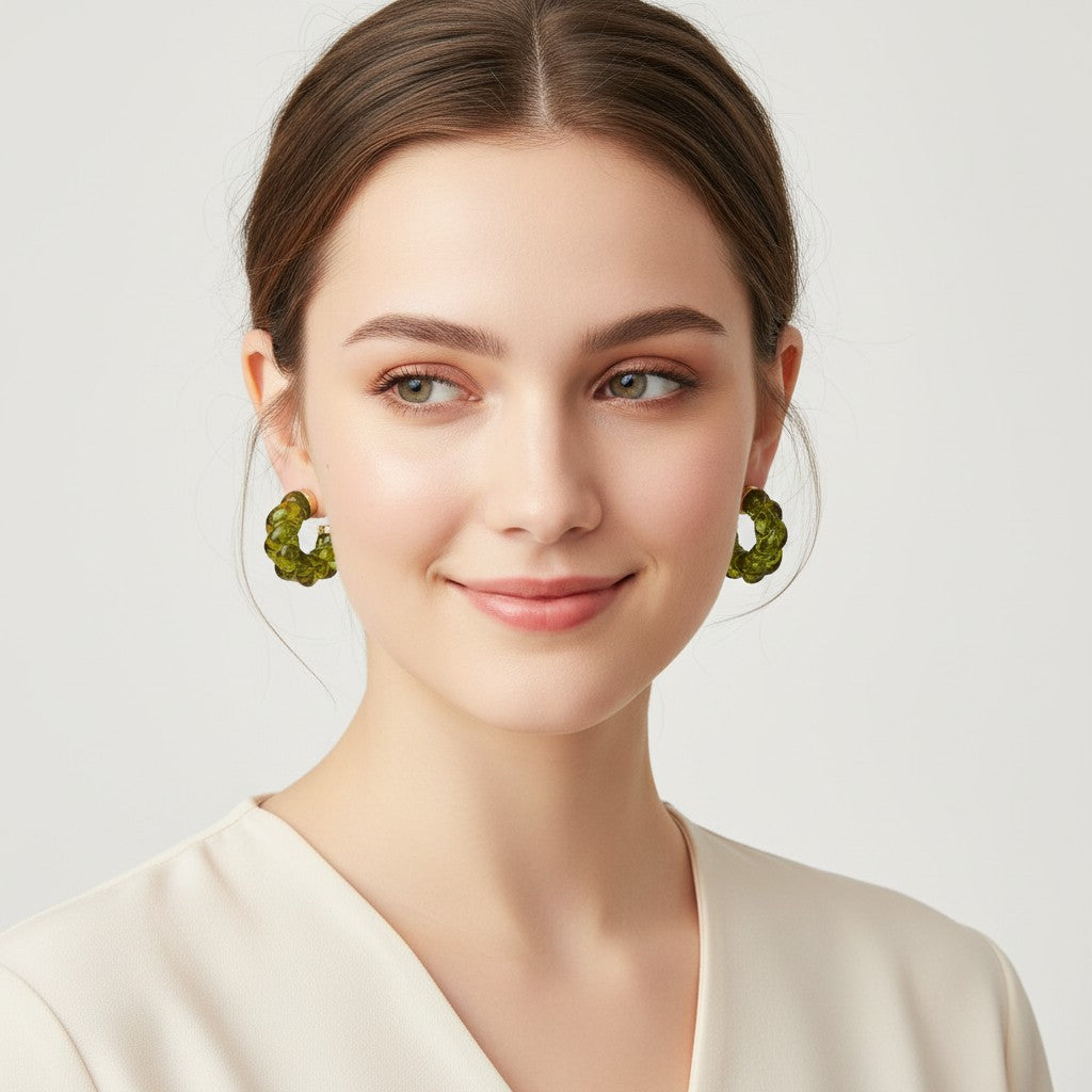 Seraphina Treasures Caelis green twisted resin hoop earrings with gold posts.
