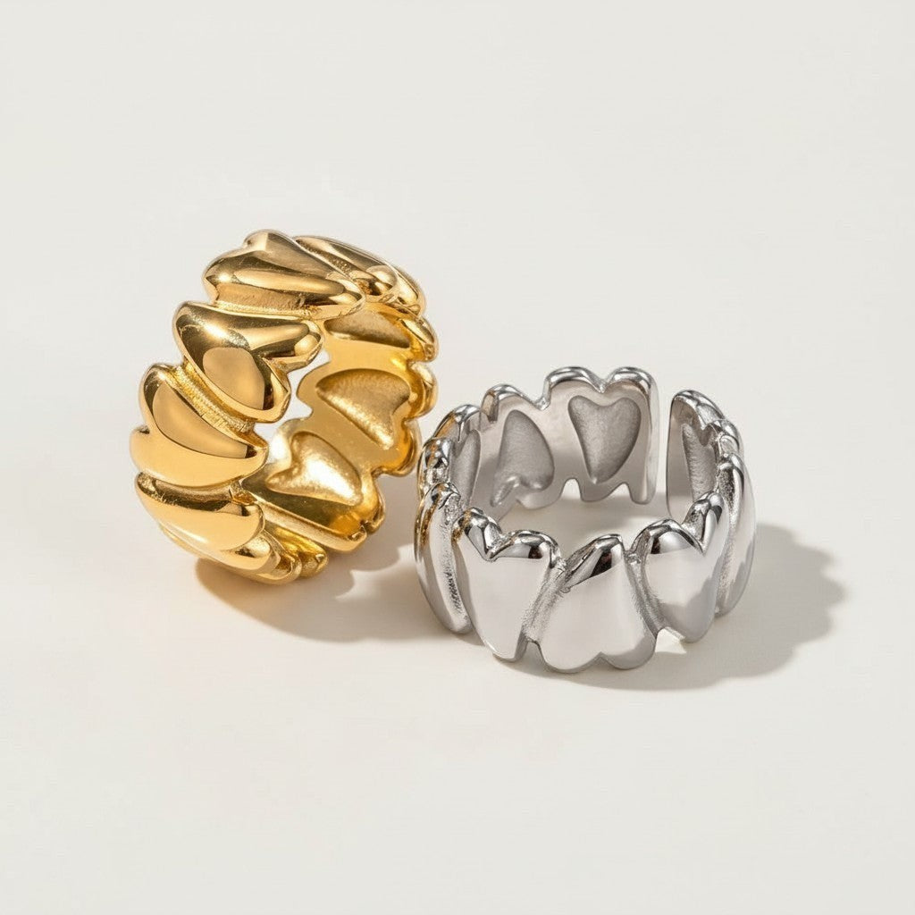 Seraphina Treasures Calliope ring in gold and silver, featuring a delicate heart design and open split band.