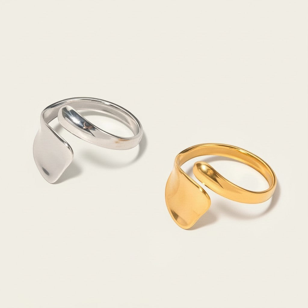 Seraphina Treasures Calyndra irregular ring in silver and gold finishes. Unique, bold statement jewelry.