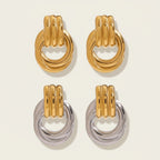 Seraphina Treasures Calypsa gold and silver tone drop earrings with ribbed top detail and intertwined hoops.