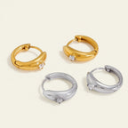 Seraphina Treasures Calyrix gold and silver hoop earrings with zircon stones.