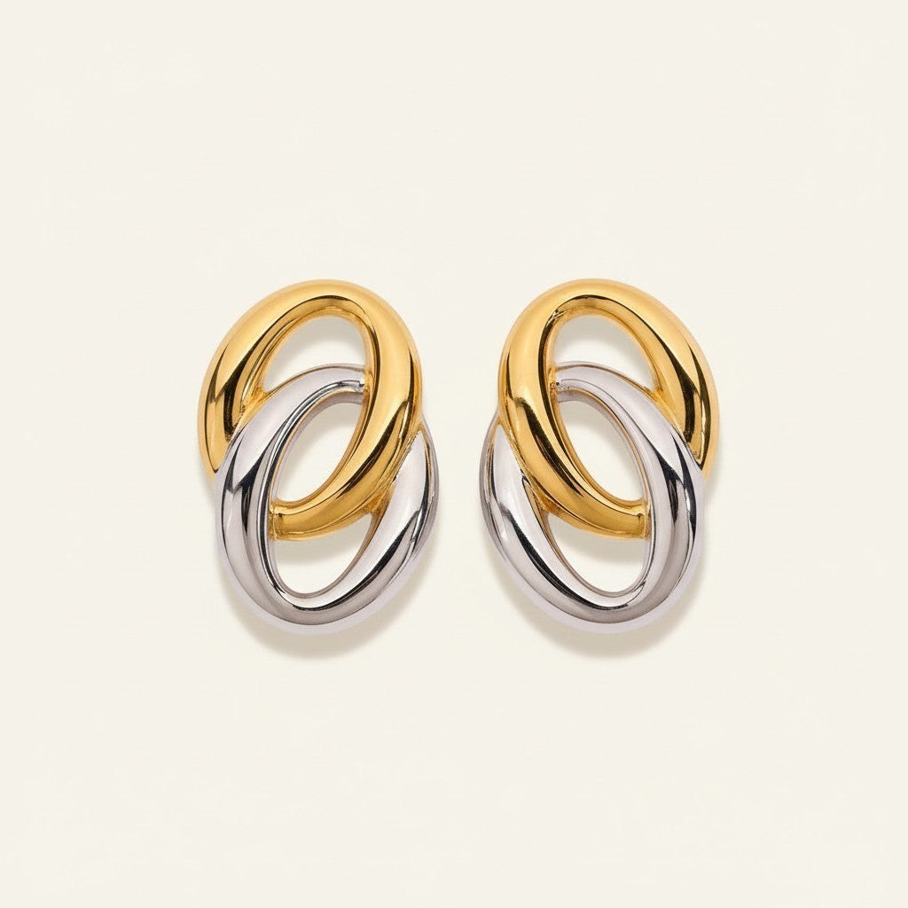 Seraphina Treasures Cassia earrings with interlocking gold and silver tone oval links. Elegant, versatile, and lightweight.