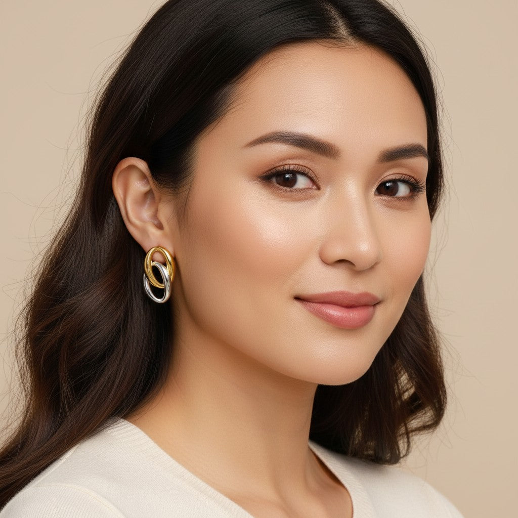 Seraphina Treasures Cassia earrings with interlocking gold and silver oval shapes. Elegant, versatile, and lightweight.