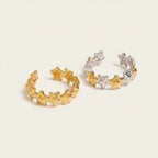 Seraphina Treasures Cassiara adjustable ring with gold and silver stars. Delicate star design, versatile fit.