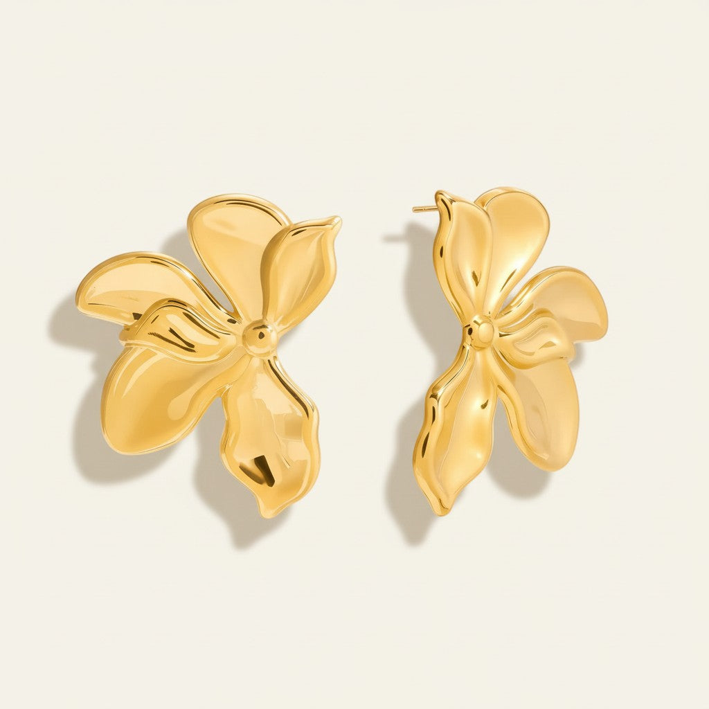 Seraphina Treasures Cassynelle gold-tone metal flower stud earrings with a polished finish.