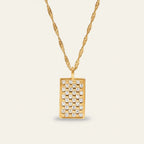 Seraphina Treasures Cecilia necklace with a gold chain and rectangular pendant inlaid with sparkling white zircon stones in a checkerboard pattern.