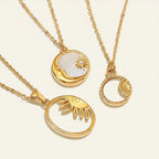 Seraphina Treasures gold necklaces with celestial pendants: moon, sun, and star motifs. Natural shell detail.