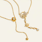 Seraphina Treasures gold necklaces with celestial moon, star, sun charms and a rose pendant, all with sparkling crystals.