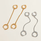 Seraphina Treasures gold and silver chain drop hoop earrings with connected rings. Modern, elegant jewelry.