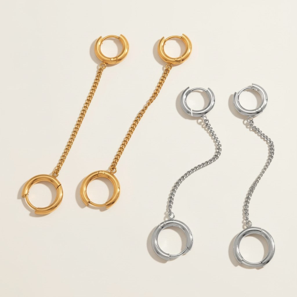 Seraphina Treasures gold and silver chain drop hoop earrings with connected rings. Modern, elegant jewelry.