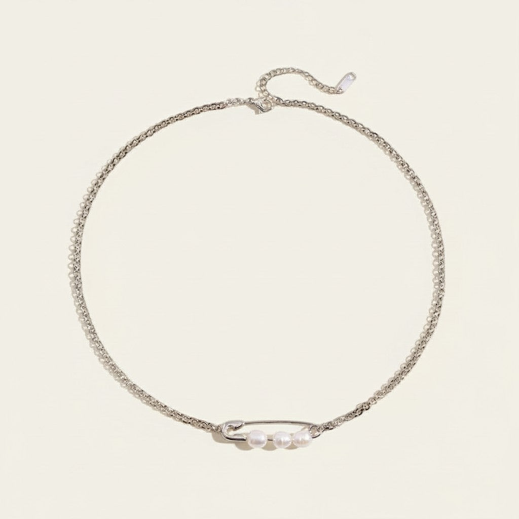 Seraphina Treasures Cornelia necklace with silver chain and paperclip clasp holding four natural pearls.