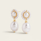 Seraphina Treasures Cyprassa gold-tone drop earrings with imitation pearls and baroque pearl drops.