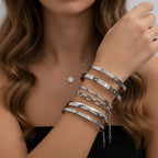 Seraphina Treasures Cyrine silver-tone bangle set with open design and textured finish, featuring star and baguette embellishments.