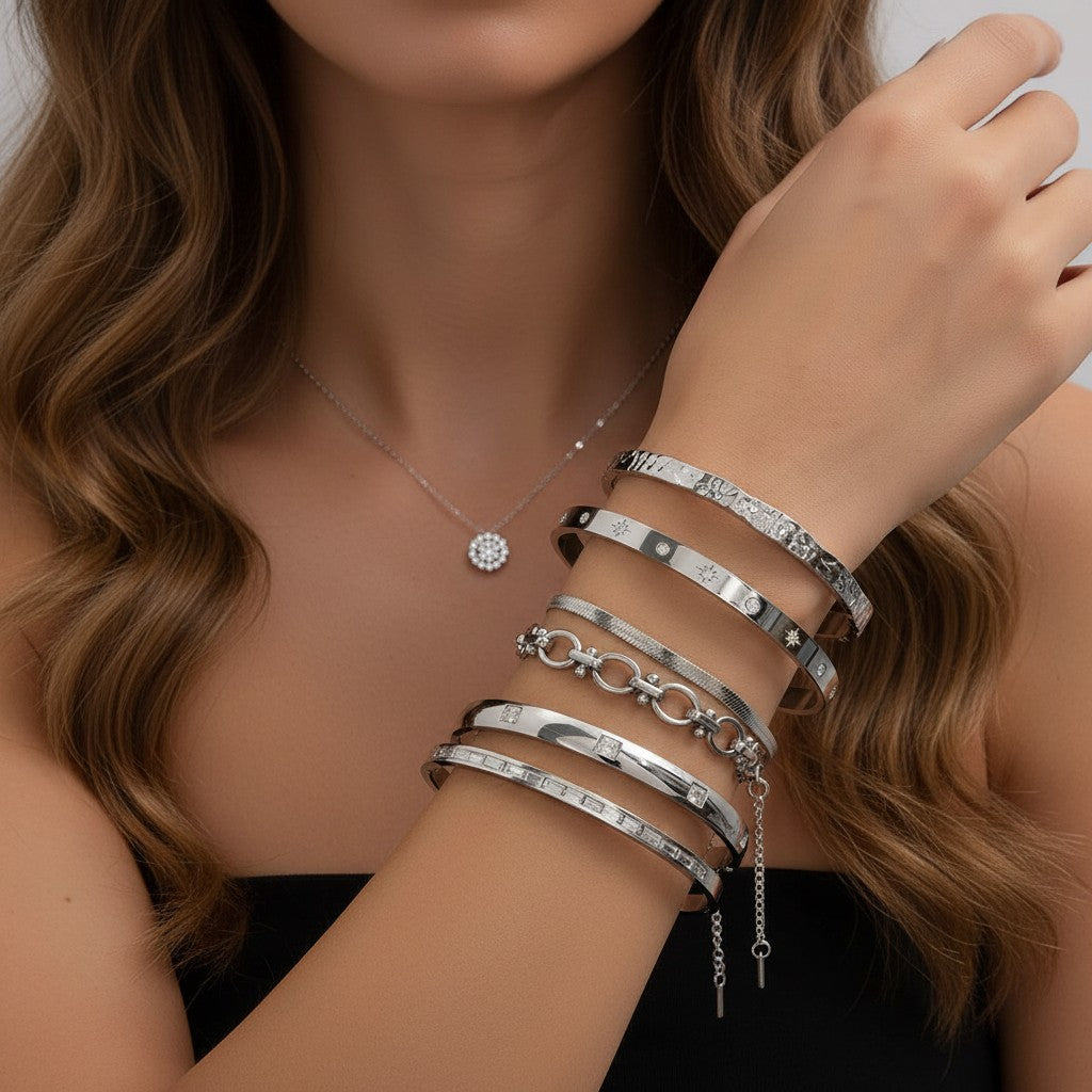 Seraphina Treasures Cyrine silver-tone bangle set with open design and textured finish, featuring star and baguette embellishments.