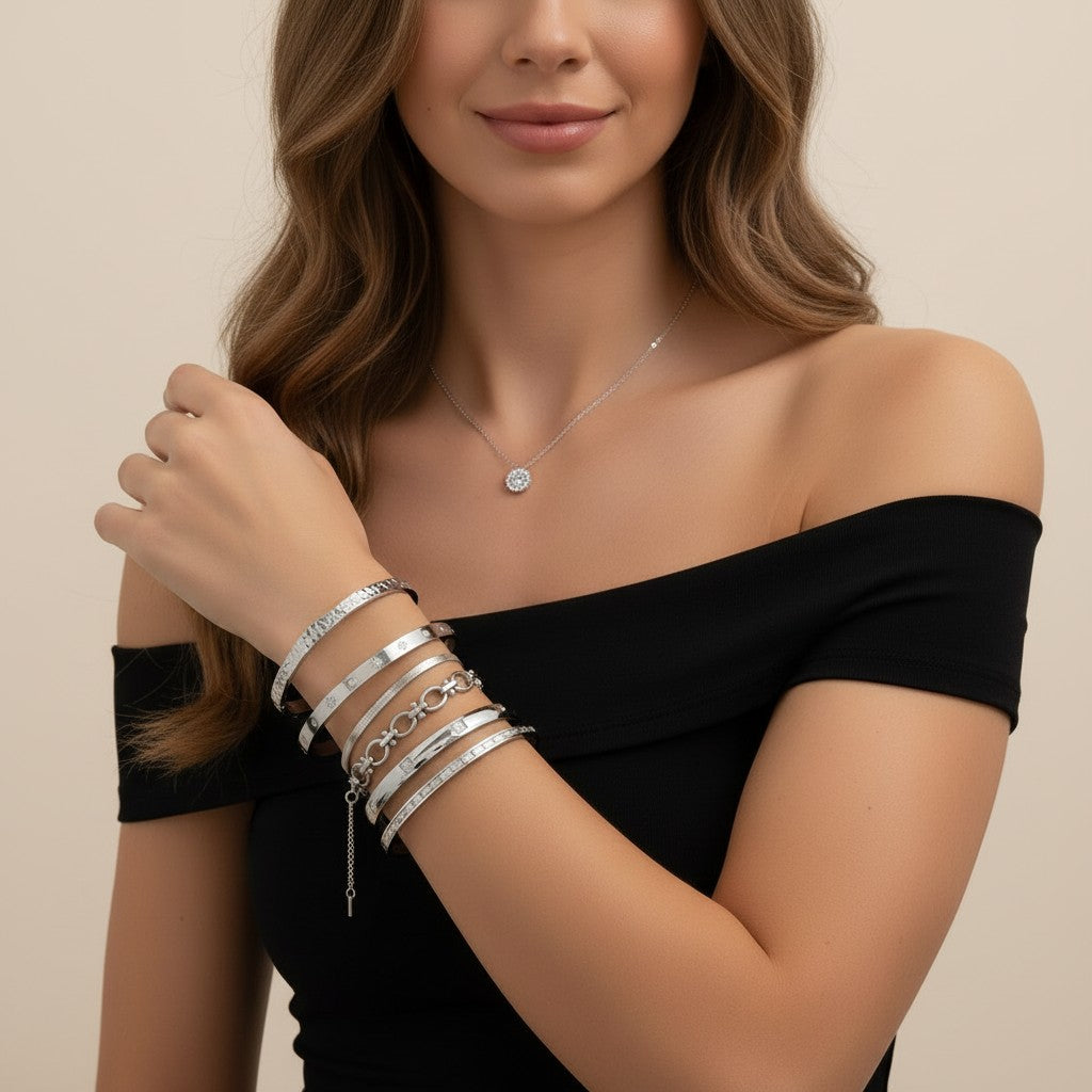 Seraphina Treasures Cyrine Bangle, silver-tone metal with textured finish and open design, adjustable fit.