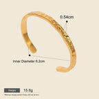 Seraphina Treasures Cyrine gold-tone open bangle with hammered texture, 0.54cm width, 6.2cm inner diameter.