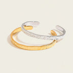 Seraphina Treasures Cyrine open bangle bracelet in gold and silver with textured finish.