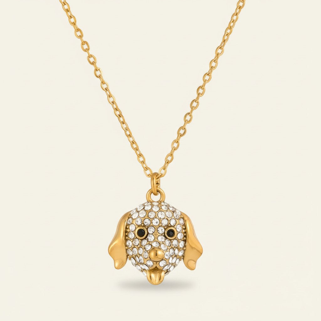 Seraphina Treasures gold-tone necklace with a crystal-encrusted dog face pendant and black eyes.