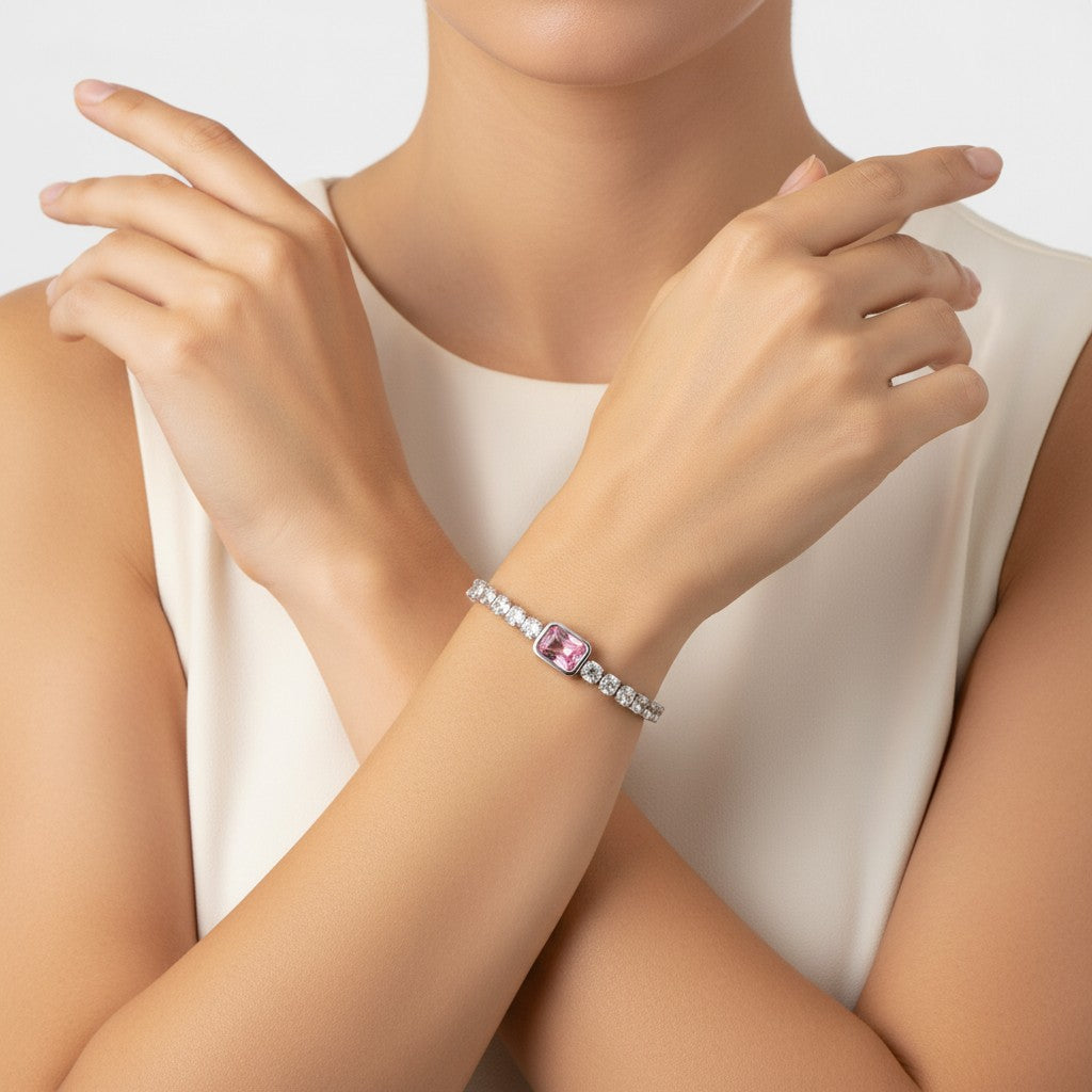 Seraphina Treasures Domitilla bracelet with clear and pink square zirconia stones, silver-tone metal, and adjustable clasp.