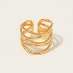 Seraphina Treasures Drusilla gold-tone metal ring with layered, open-cuff skeleton design.