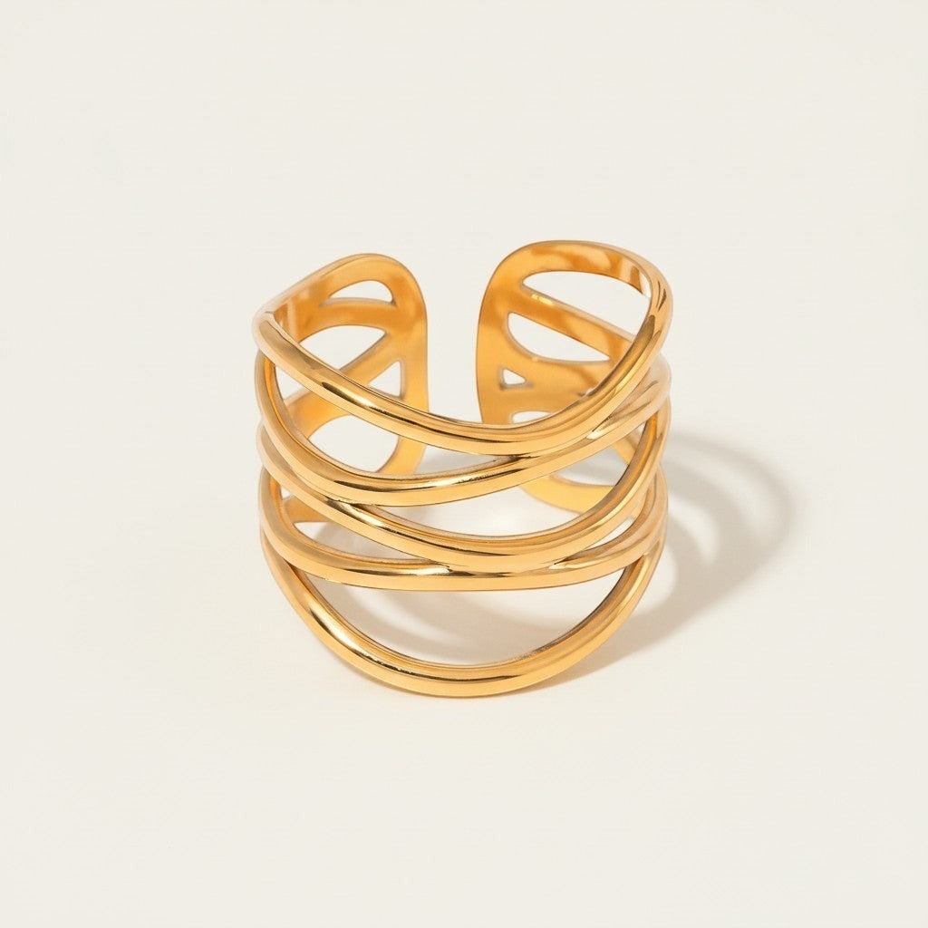 Seraphina Treasures Drusilla gold-tone metal ring with layered, open-cuff skeleton design.