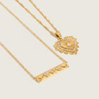 Seraphina Treasures Eirene gold necklaces: one heart pendant with zircon, one bar pendant with heart details and zircon.
