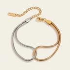 Seraphina Treasures Eirian dual-tone snake chain bracelet in gold and silver.