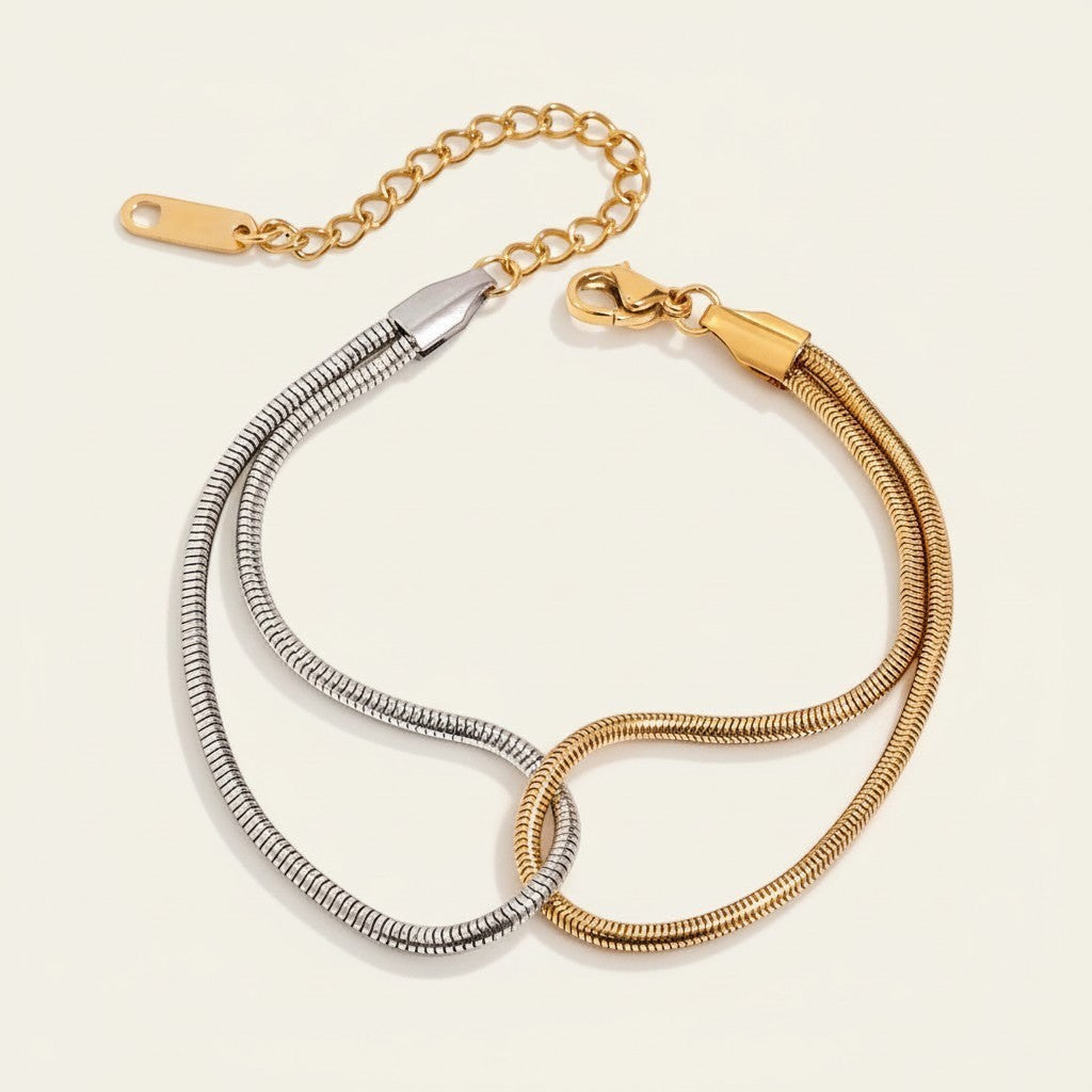Seraphina Treasures Eirian dual-tone snake chain bracelet in gold and silver.