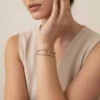 Seraphina Treasures Eirian dual-tone bracelet with interlocking design in silver and gold.