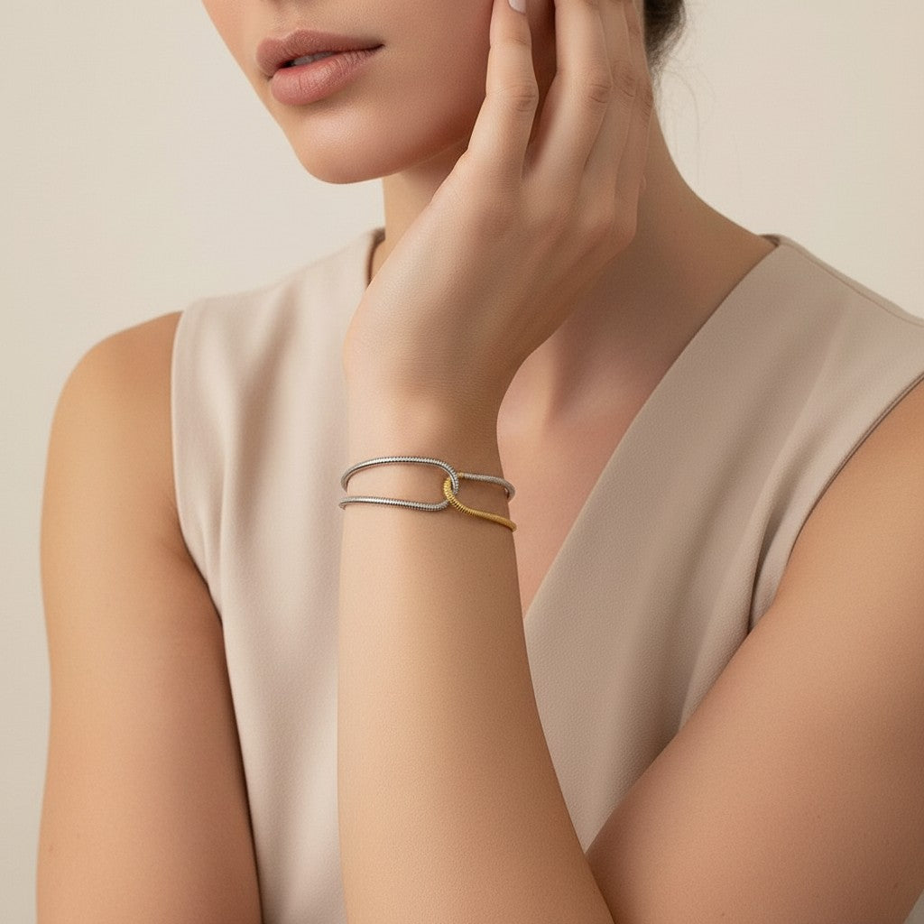 Seraphina Treasures Eirian dual-tone bracelet with interlocking design in silver and gold.