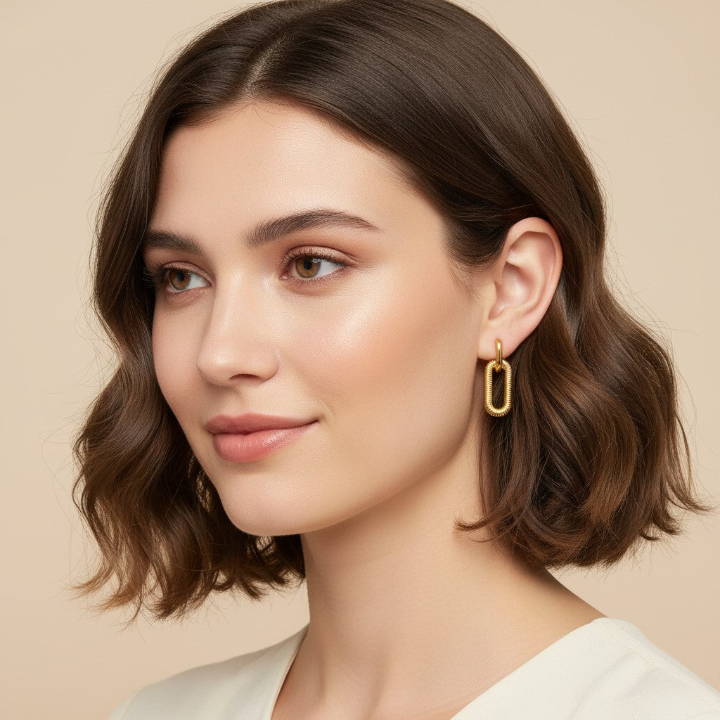 Seraphina Treasures Eirlys gold oval link drop earrings with ribbed texture. Elegant, lightweight statement jewelry.